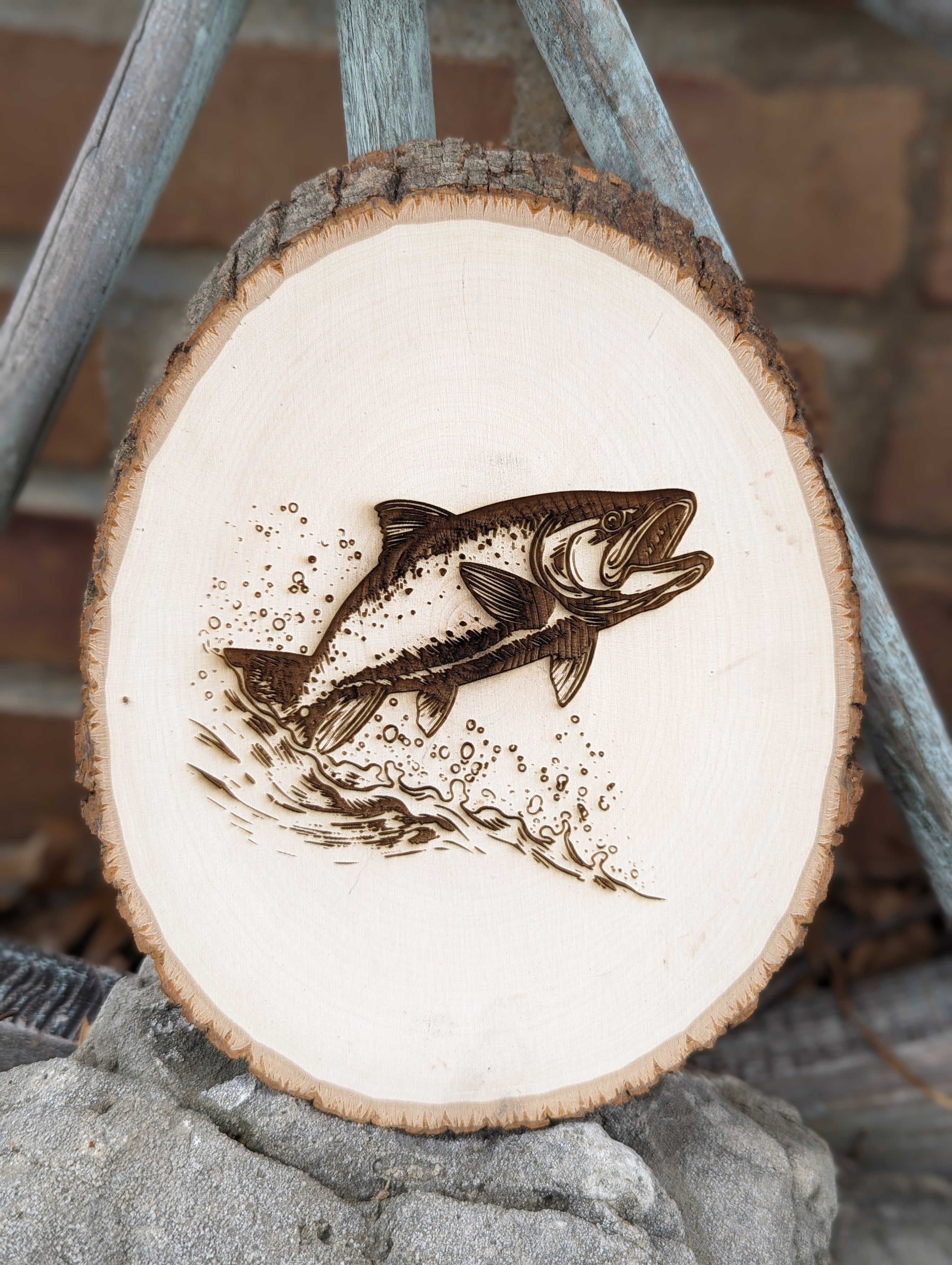 Fish engraved wood round signs – Liberty Bell Laser Co.
