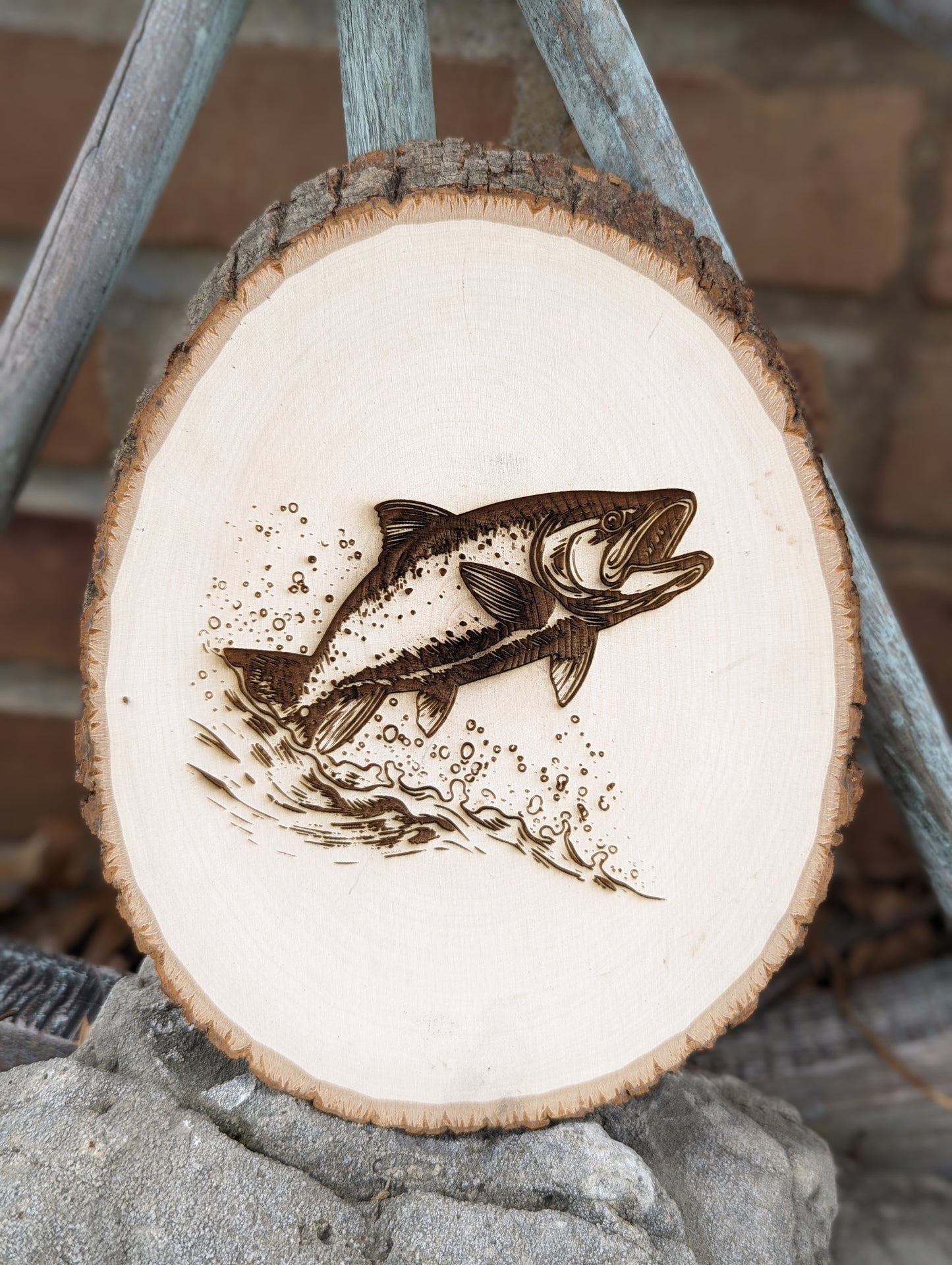 Fish engraved wood round signs